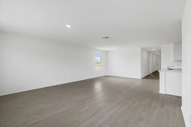 a view of kitchen with wooden floor
