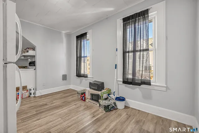 a room with furniture and a window