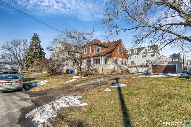 a view of a street with houses