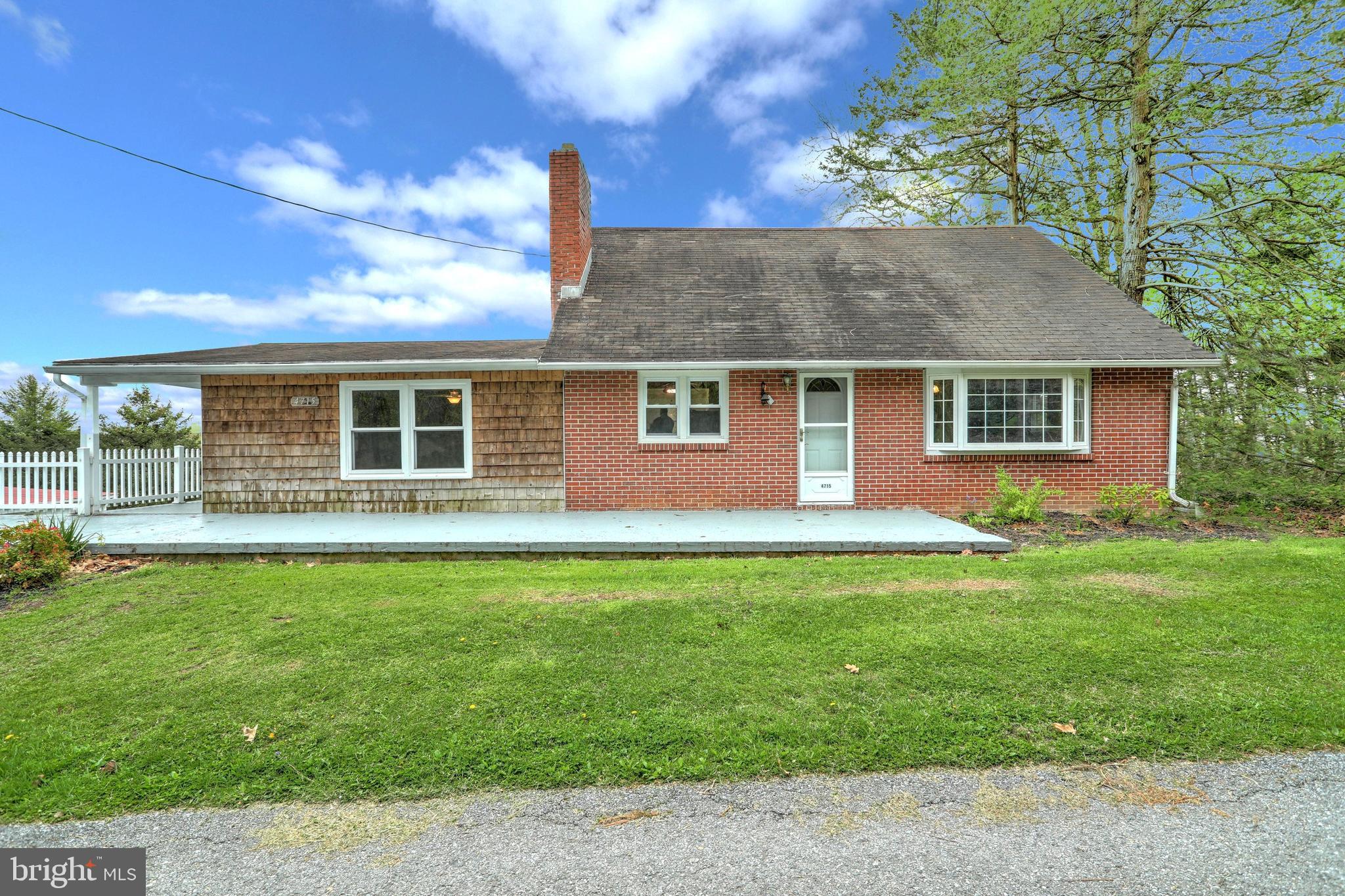 4 Car Garage Brick Cape Cod