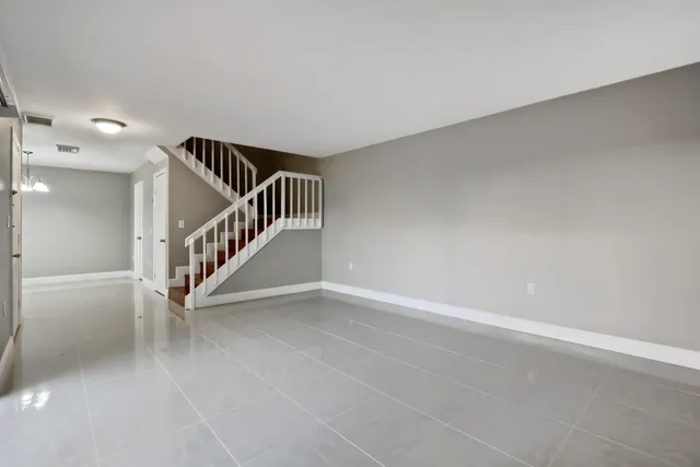 a view of an entryway with stairs