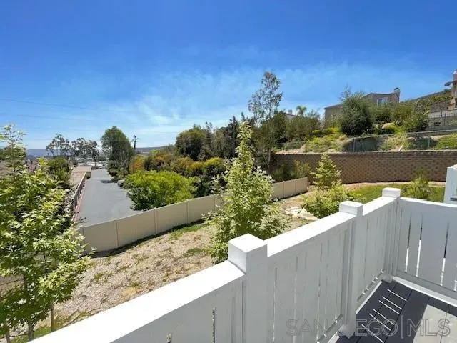 a view of a lake from a balcony