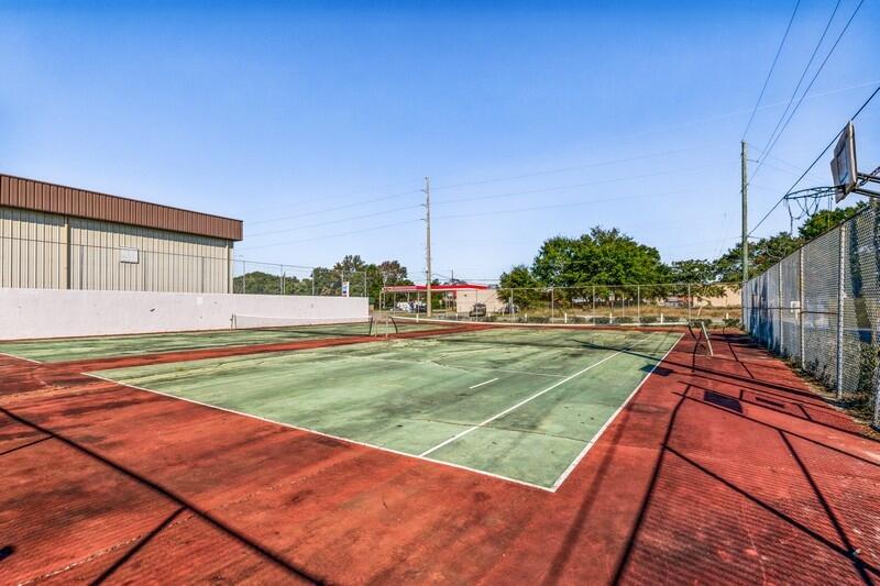 210 Pelham Road, Unit 201A Fort Walton Beach, FL 32547 - Photo 30 of 38 a view of a tennis court