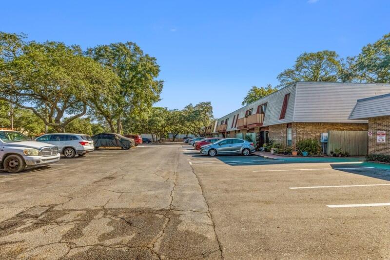 210 Pelham Road, Unit 201A Fort Walton Beach, FL 32547 - Photo 6 of 38 a view of street with parked cars