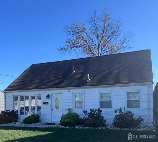 a view of house with yard