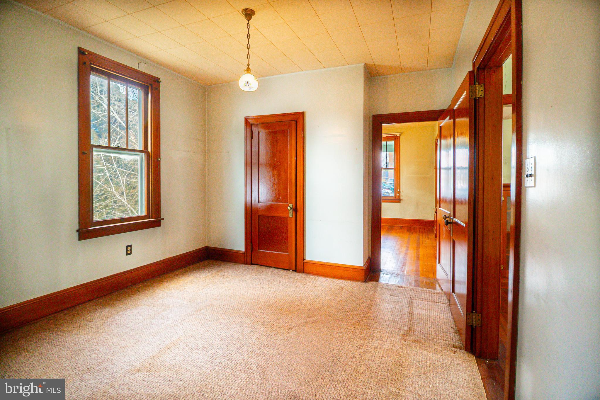 232 Henderson Street Carlisle, PA 17013 - Photo 11 of 28 a view of livingroom with window and hardwood floor