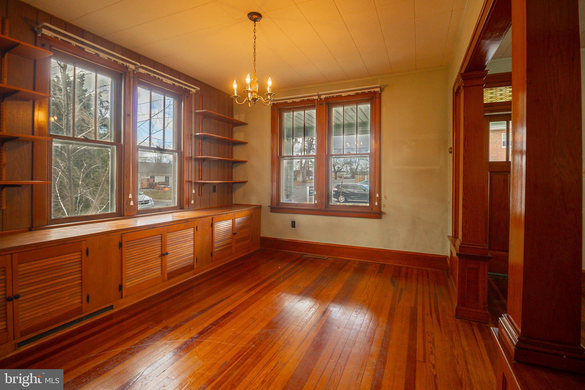 232 Henderson Street Carlisle, PA 17013 - Photo 13 of 28 a view of an empty room with wooden floor and a window