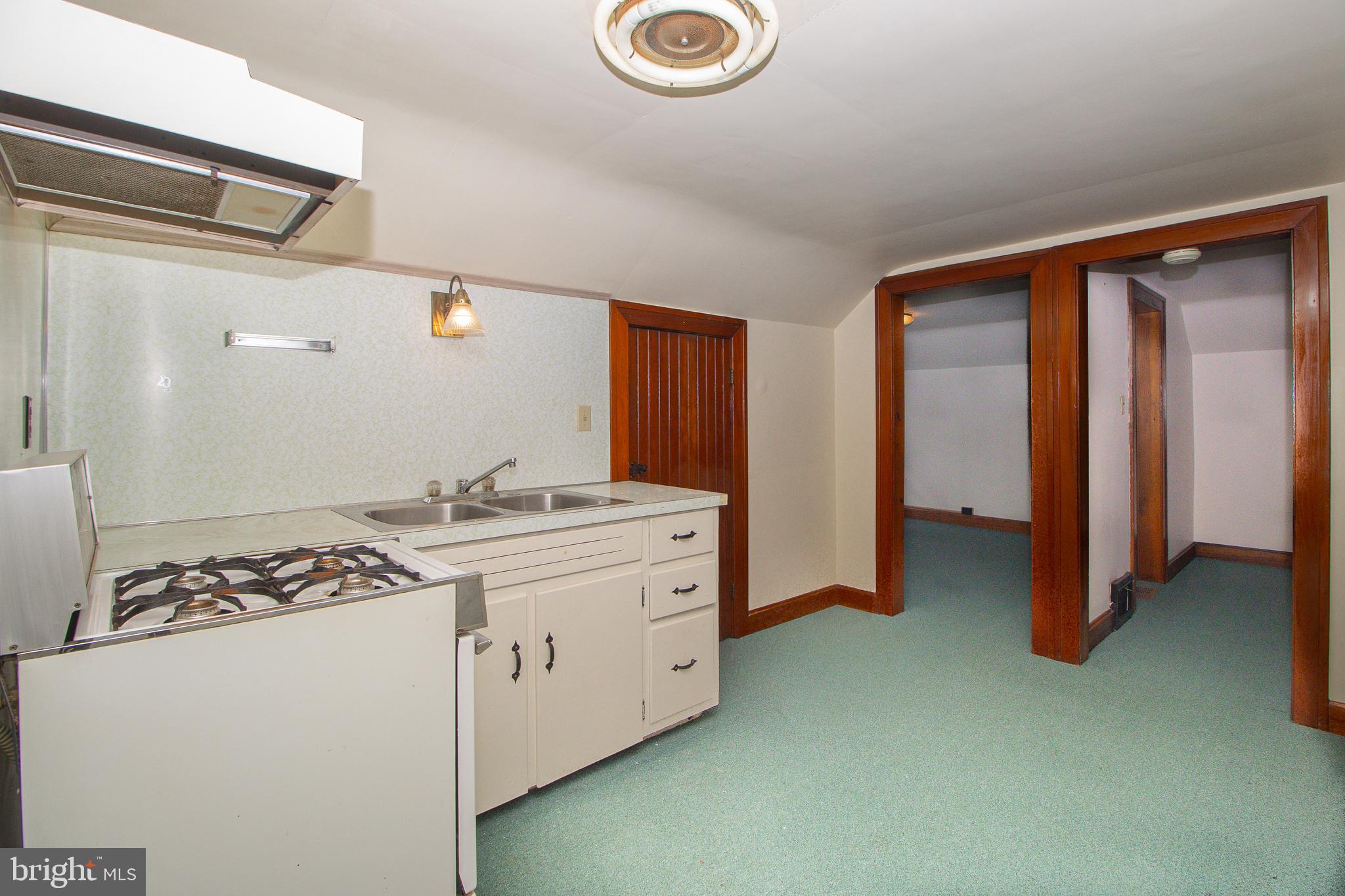 232 Henderson Street Carlisle, PA 17013 - Photo 21 of 28 a kitchen with stainless steel appliances granite countertop a stove and a refrigerator