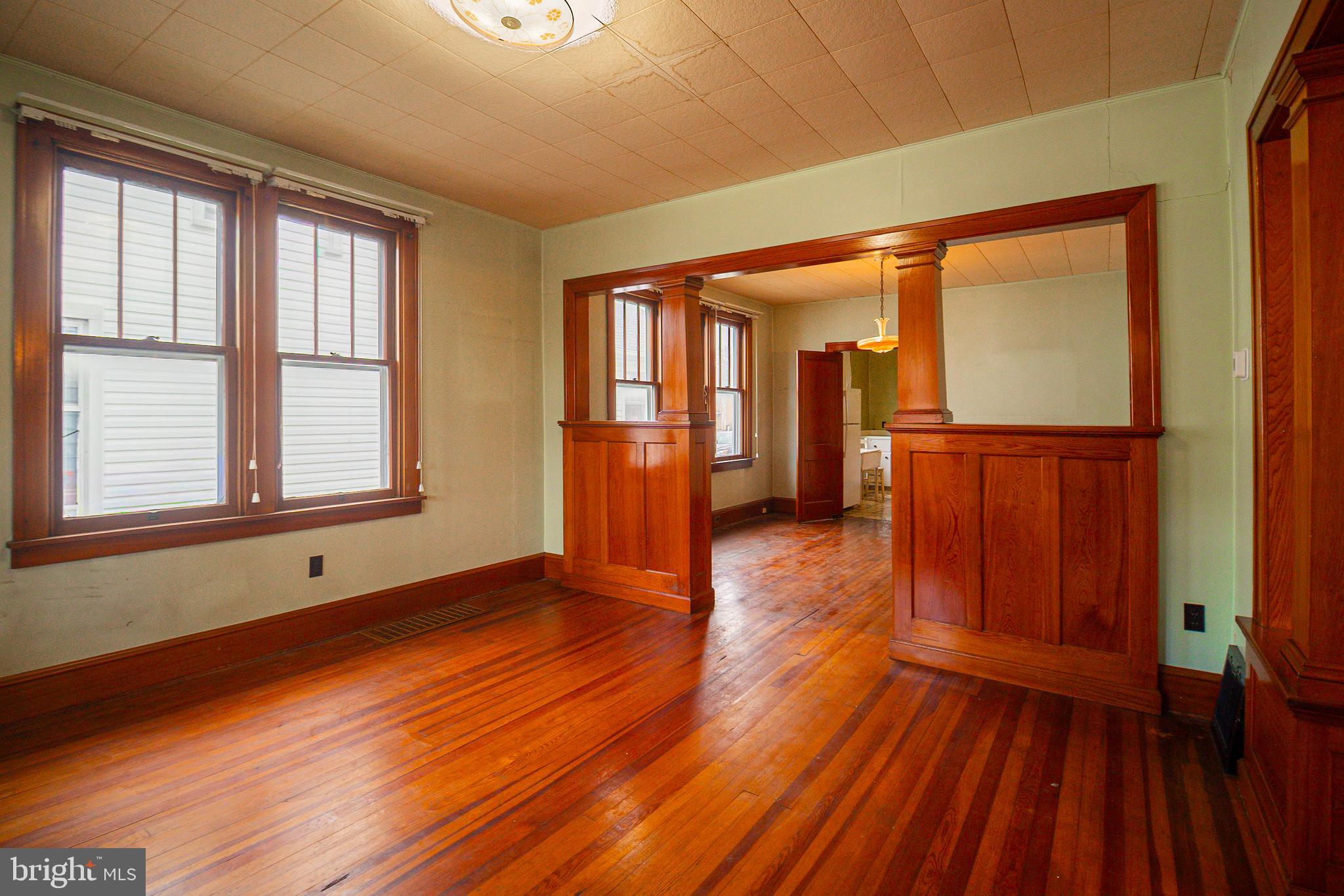 232 Henderson Street Carlisle, PA 17013 - Photo 6 of 28 wooden floor in an empty room with a window
