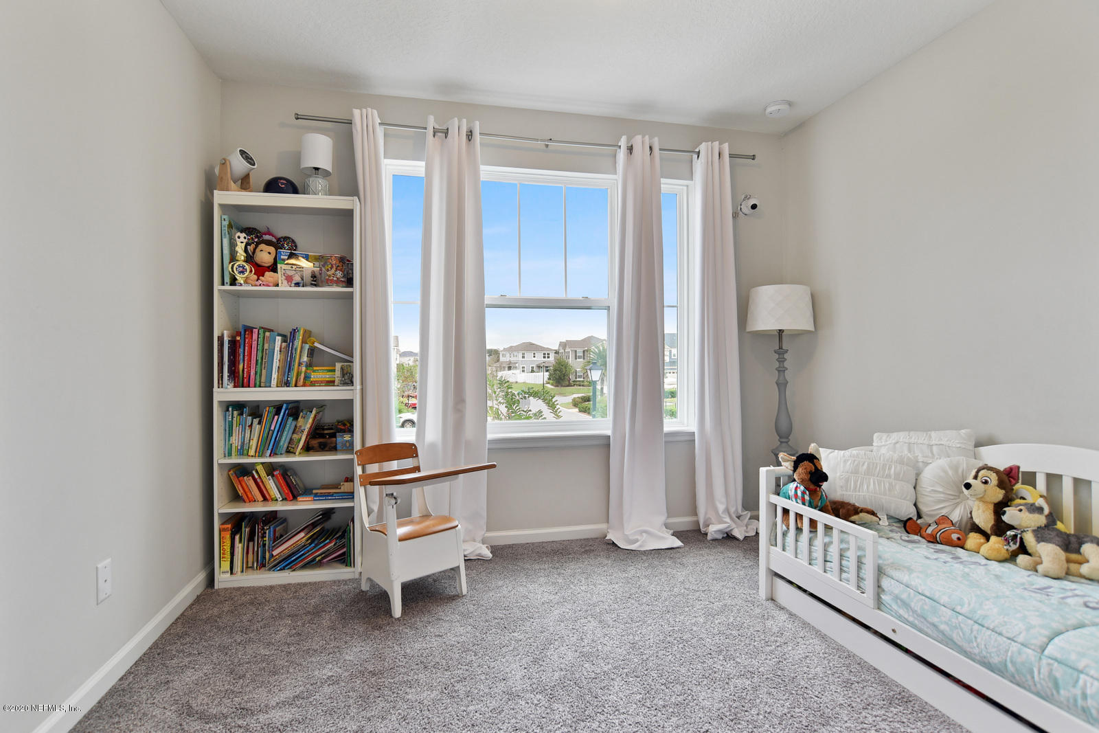 14780 Trellis Street Jacksonville, FL 32258 - Photo 23 of 29 a room with furniture and a window