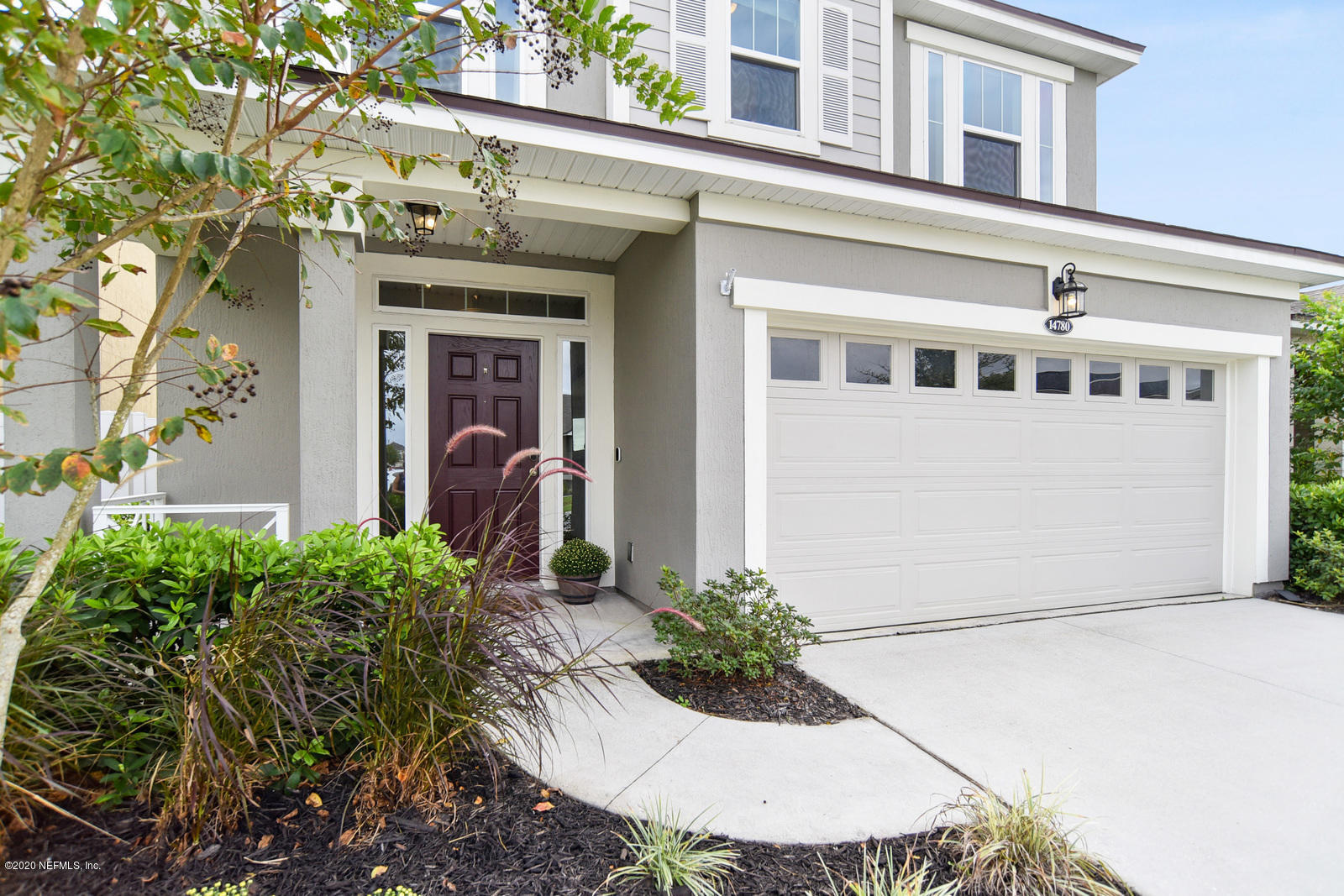 14780 Trellis Street Jacksonville, FL 32258 - Photo 3 of 29 a front view of a house with a yard