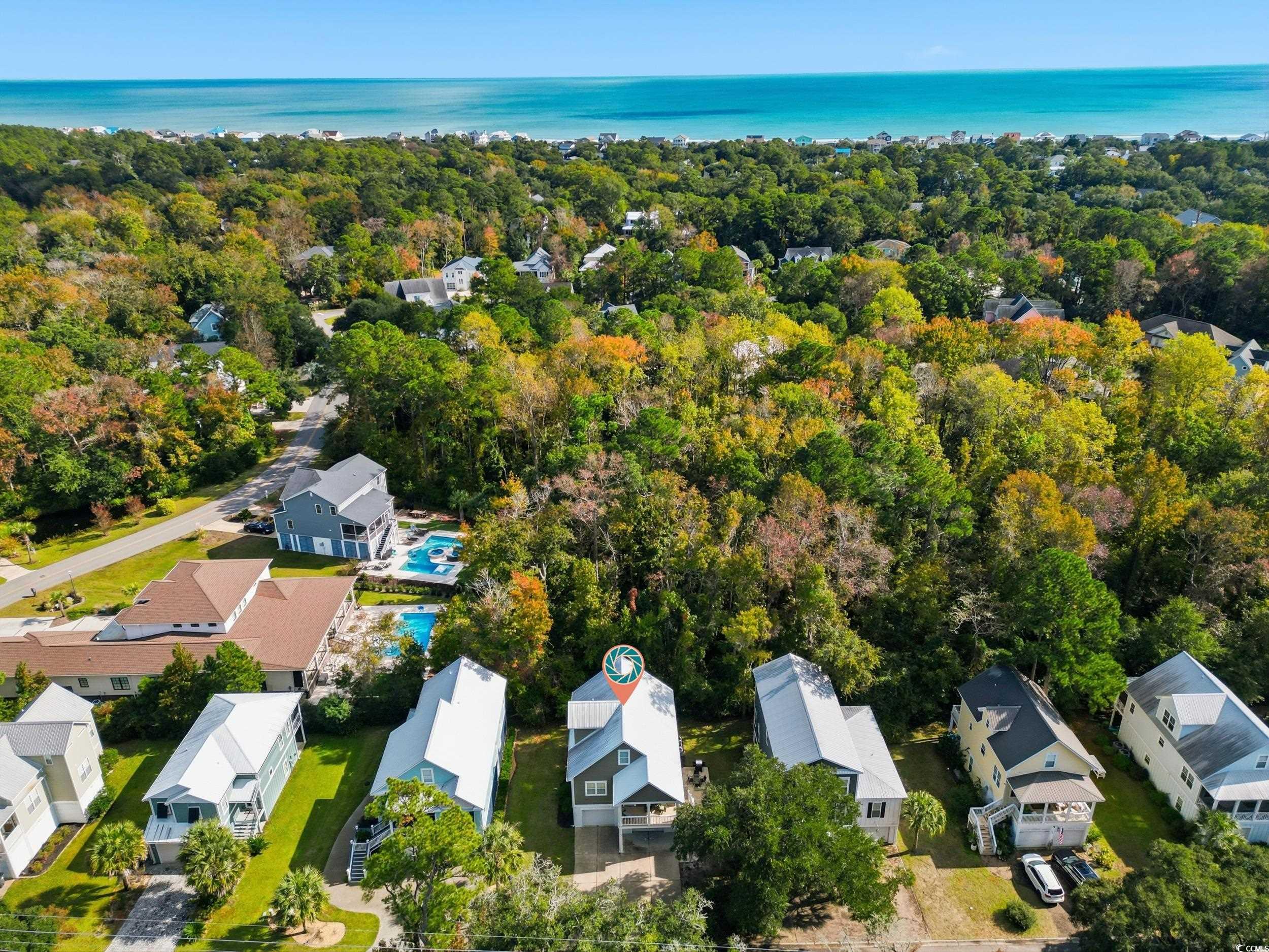 43 Sandlapper Way Pawleys Island, SC 29585 - Photo 33 of 33 Aerial perspective of suburban area featuring a large body of water