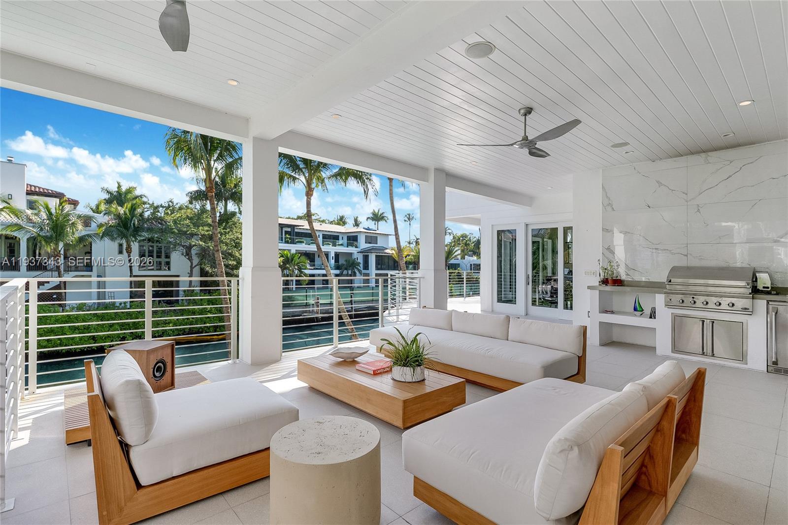3835 Carole Court Miami, FL 33133 - Photo 36 of 41 a living room with furniture and a large window