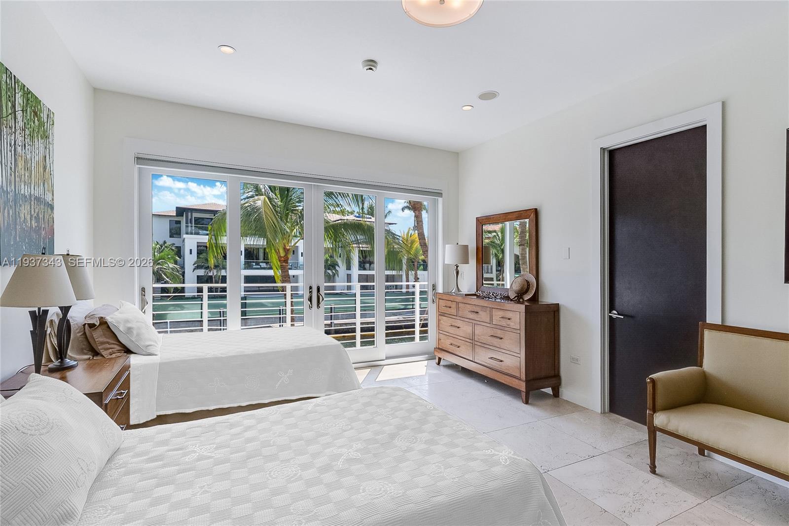3835 Carole Court Miami, FL 33133 - Photo 10 of 41 a bedroom with furniture and a large window