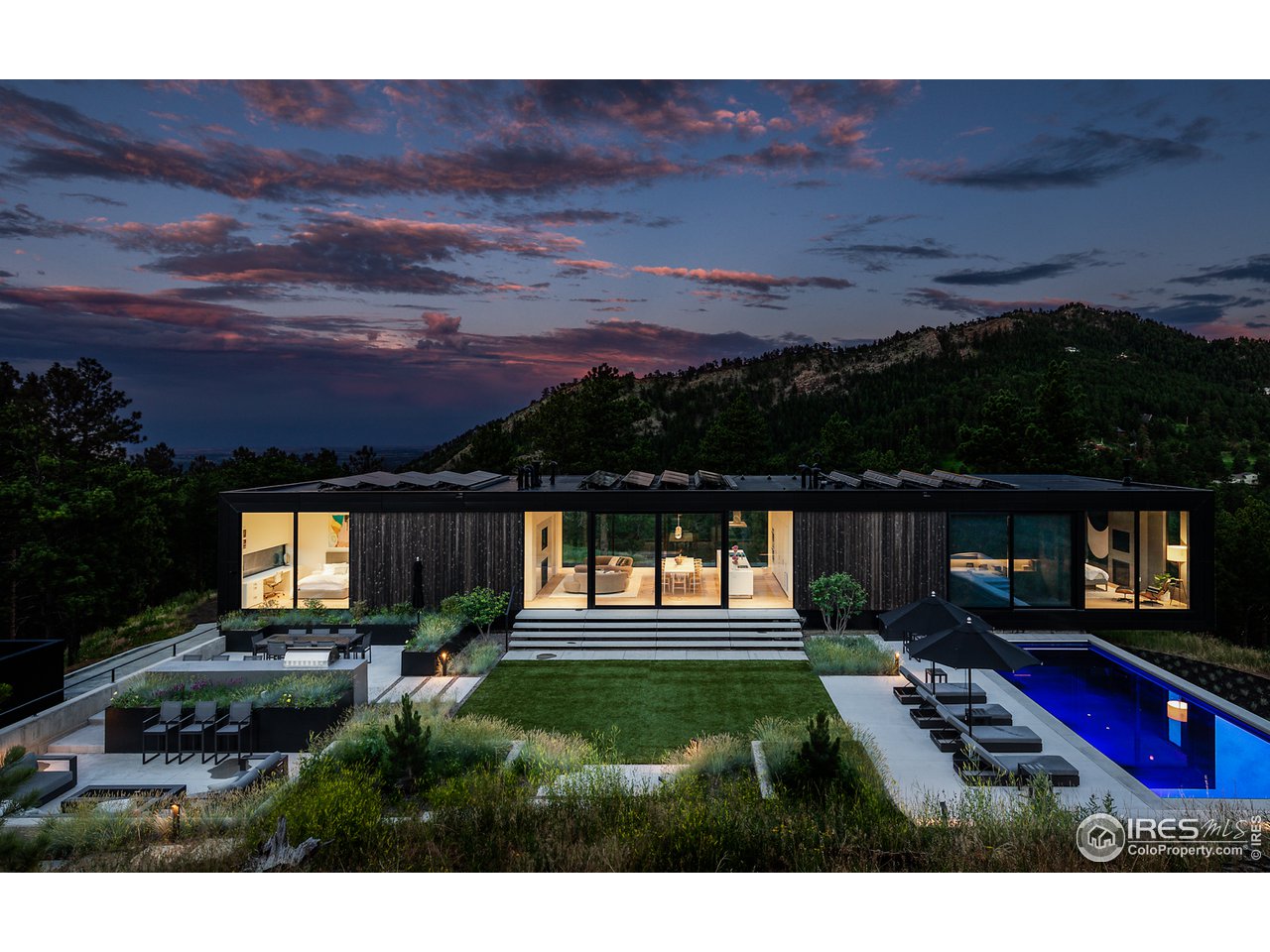Undisclosed Address Boulder, CO 80302 - Photo 1 of 1 a front view of a house with a yard