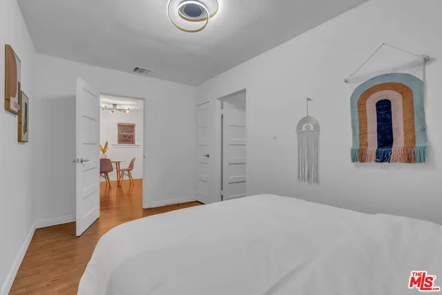 a bathroom with a toilet sink and shower