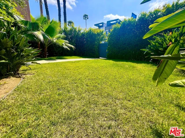a view of swimming pool with a patio