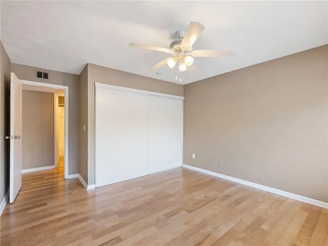 a view of a small house with a patio