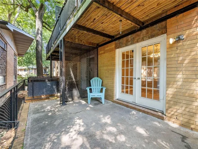 a view of a house with a tree