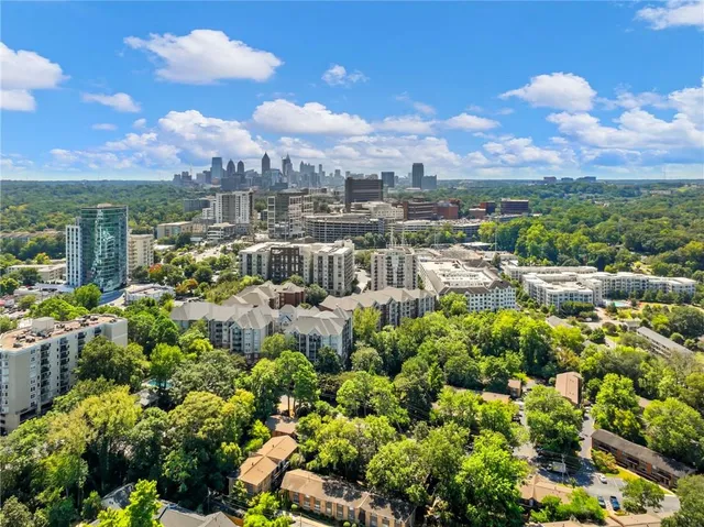a view of a city with tall buildings