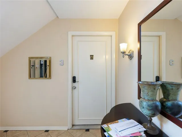 a bedroom with a bed and furniture