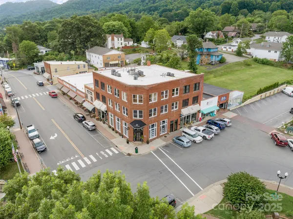 a view of a street in front of a building