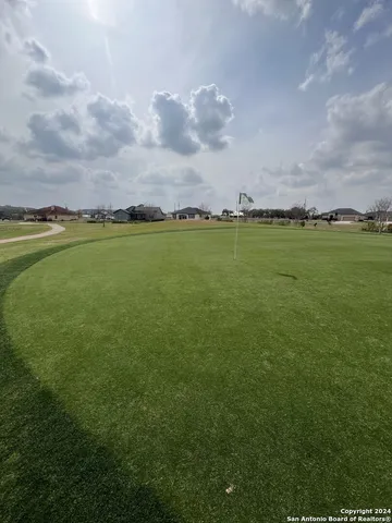 a view of a lake and houses with city view