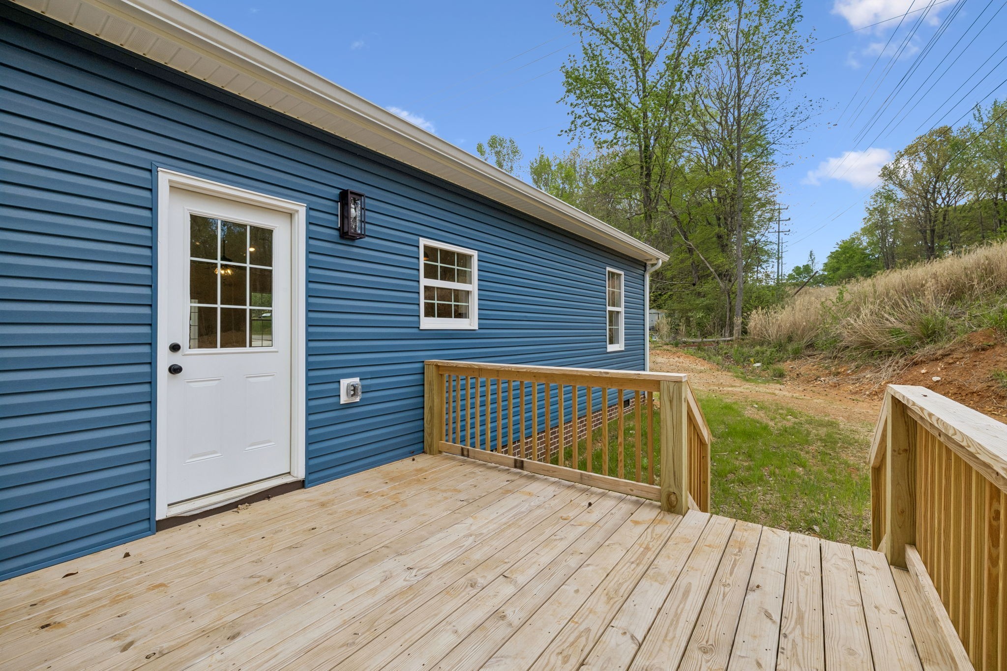 613 Hill Road Clarksville, TN 37040 - Photo 26 of 30 a view of backyard with deck and wooden floor