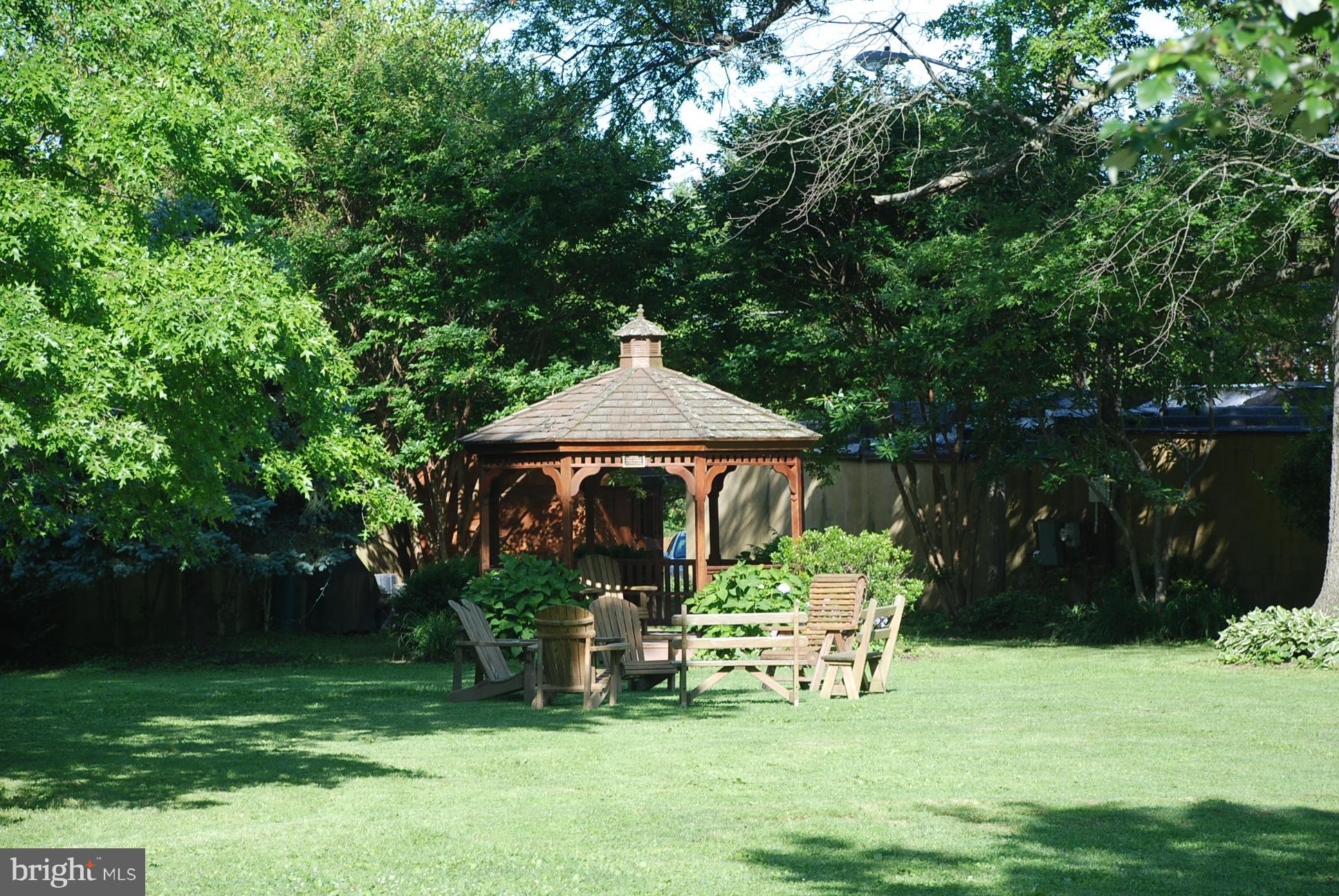 6441 Blenheim Road Baltimore, MD 21212 - Photo 22 of 23 a view of a chair and table of the garden