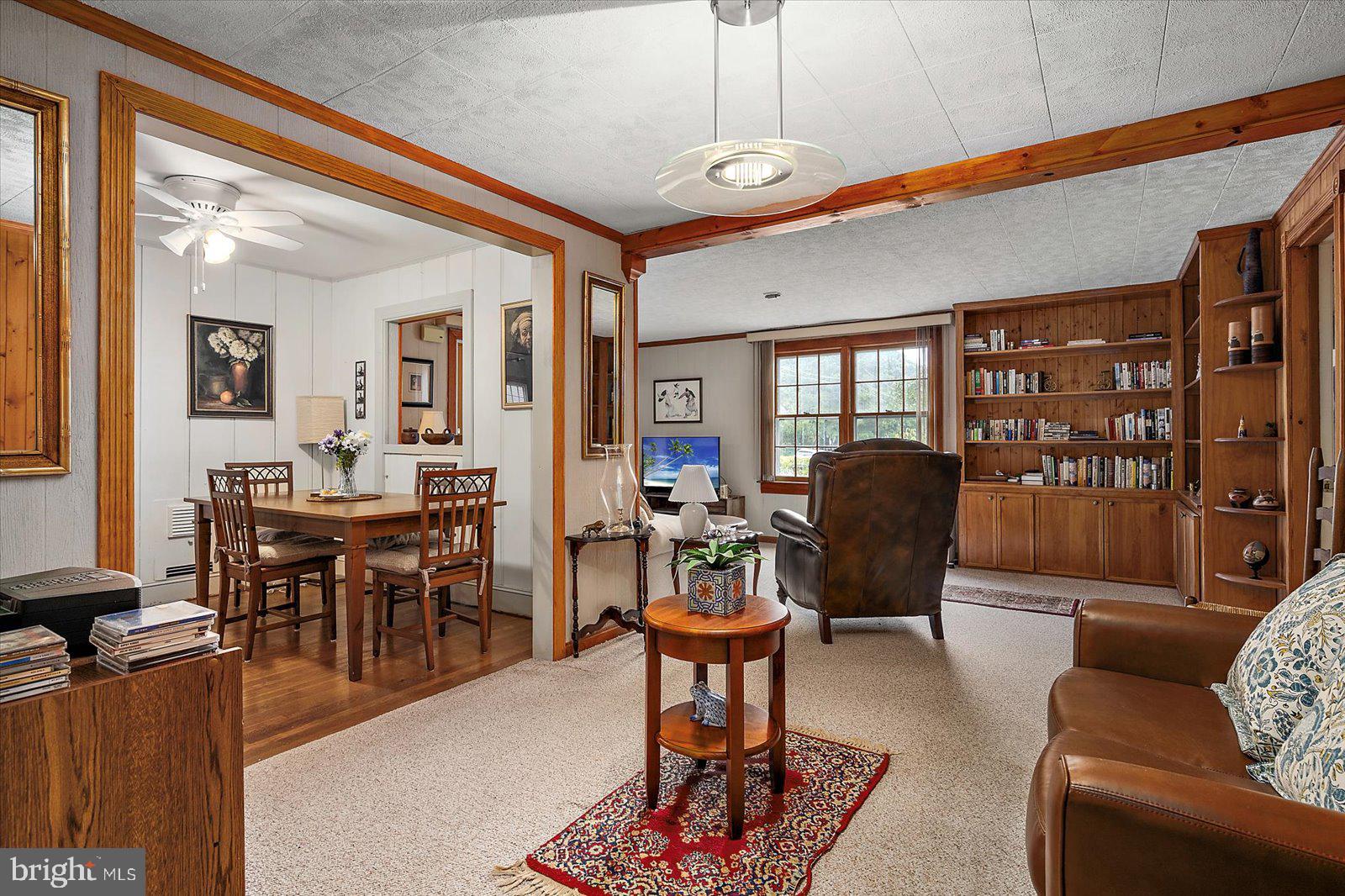 1001 Riverside Drive Salisbury, MD 21801 - Photo 11 of 47 a living room with furniture a rug and a large window