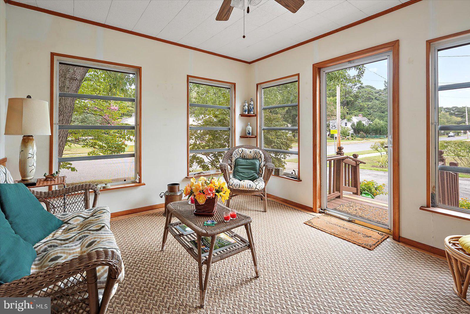 1001 Riverside Drive Salisbury, MD 21801 - Photo 17 of 47 a living room with furniture and floor to ceiling windows