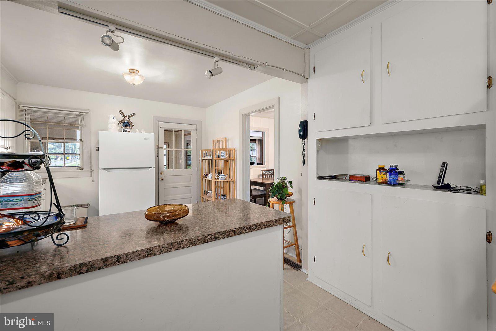 1001 Riverside Drive Salisbury, MD 21801 - Photo 25 of 47 a view of kitchen with refrigerator and workspace
