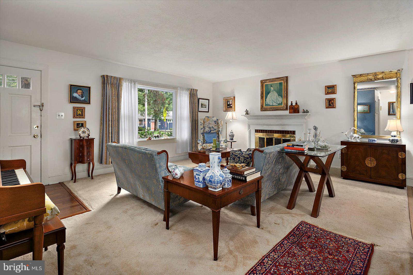 1001 Riverside Drive Salisbury, MD 21801 - Photo 3 of 47 a living room with furniture and a fireplace