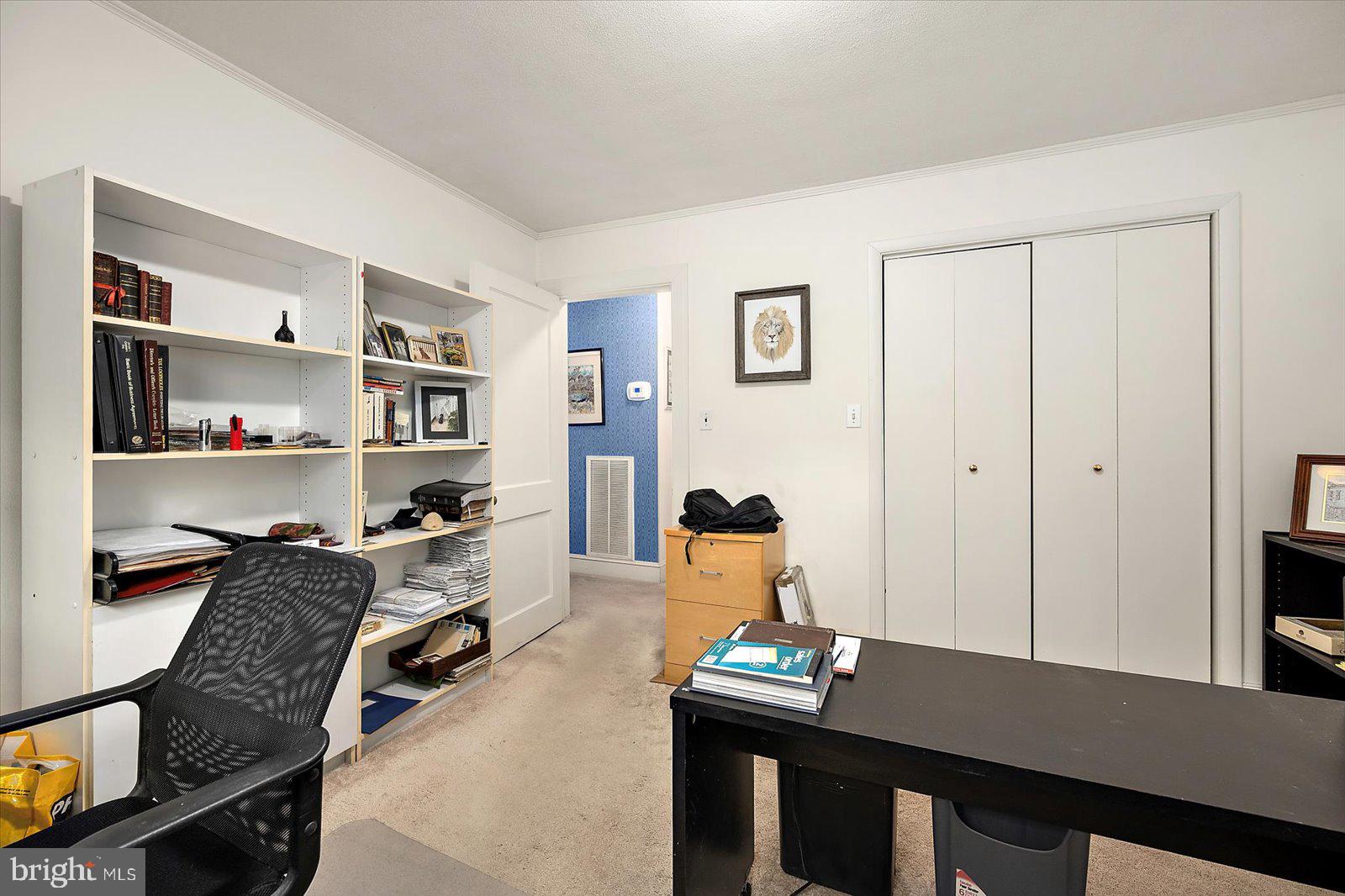 1001 Riverside Drive Salisbury, MD 21801 - Photo 33 of 47 a workspace with furniture and bookshelf