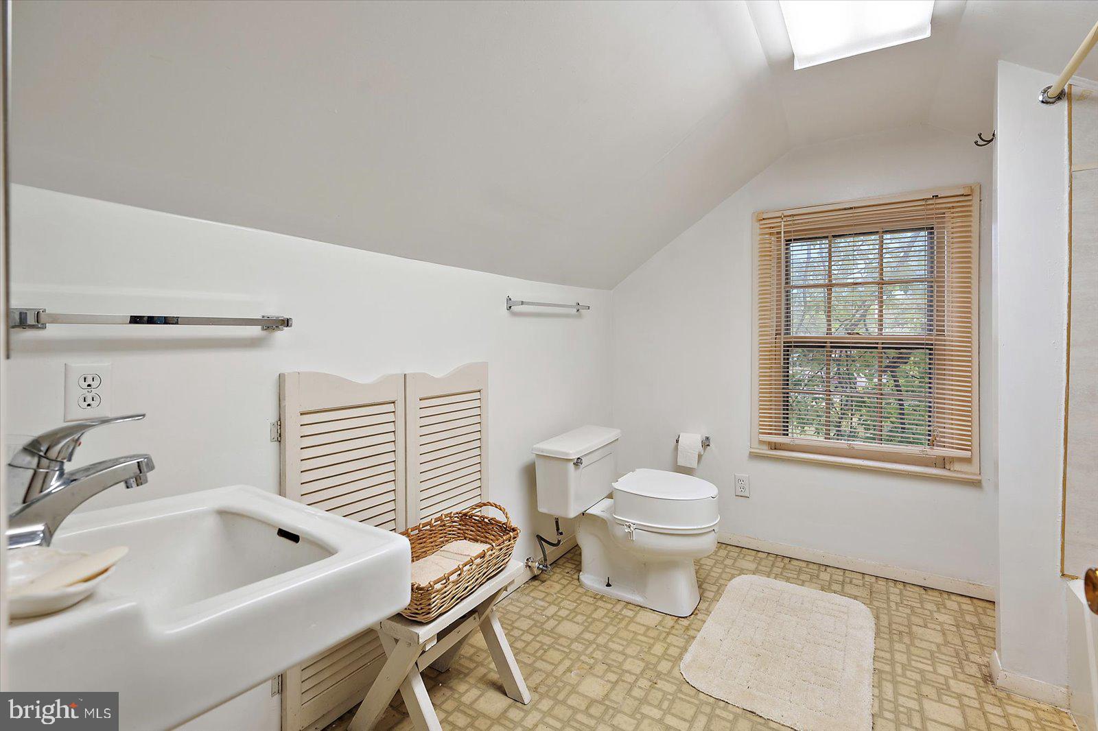 1001 Riverside Drive Salisbury, MD 21801 - Photo 40 of 47 a bathroom with a sink a toilet and tub