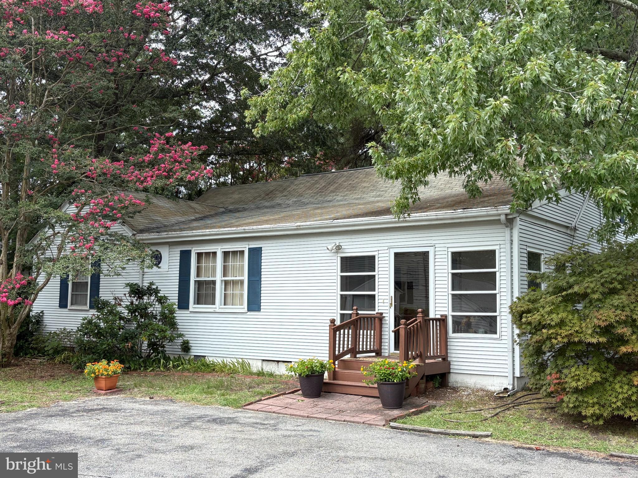 1001 Riverside Drive Salisbury, MD 21801 - Photo 42 of 47 a front view of a house with garden