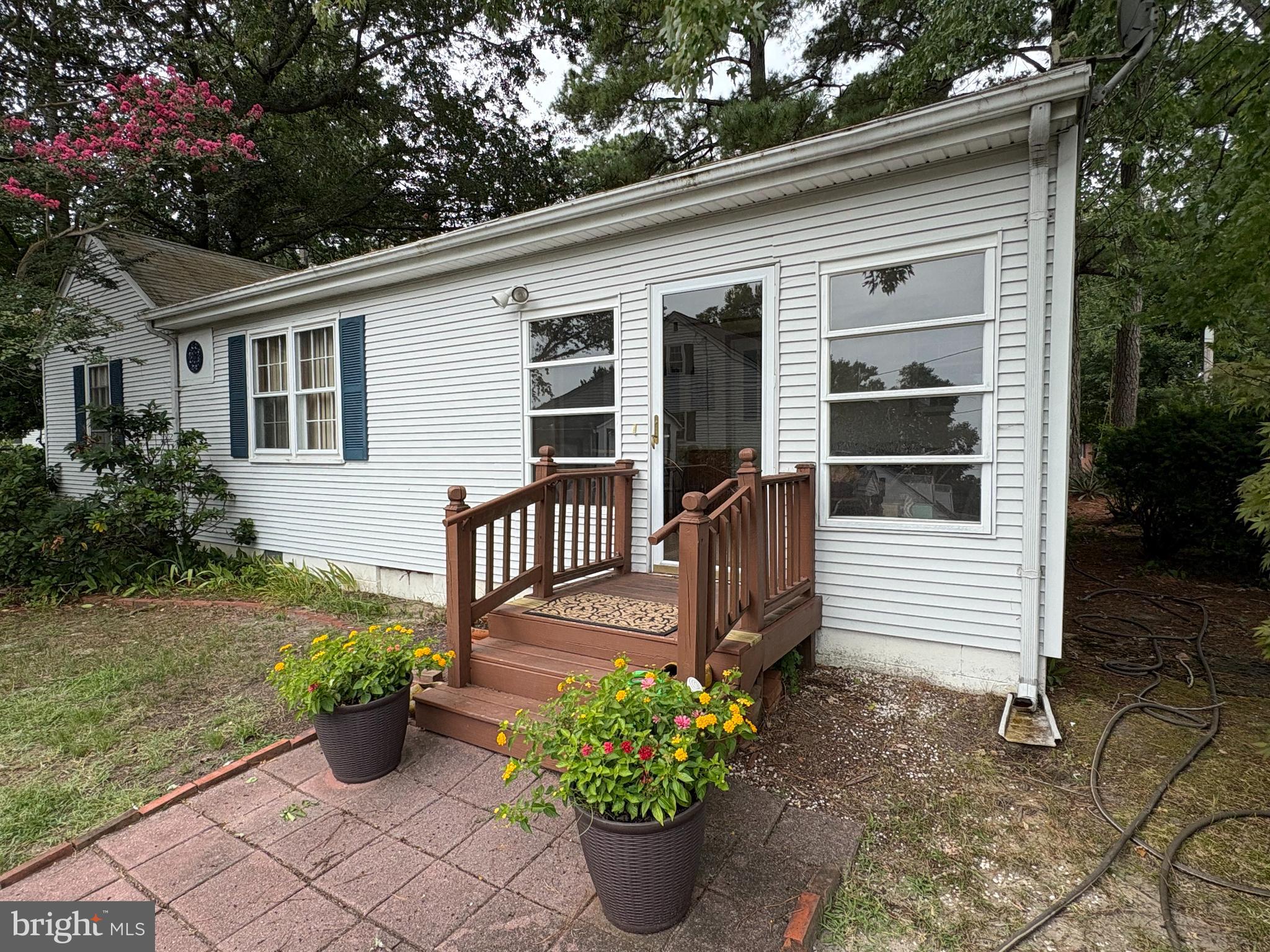 1001 Riverside Drive Salisbury, MD 21801 - Photo 43 of 47 a front view of a house with a yard