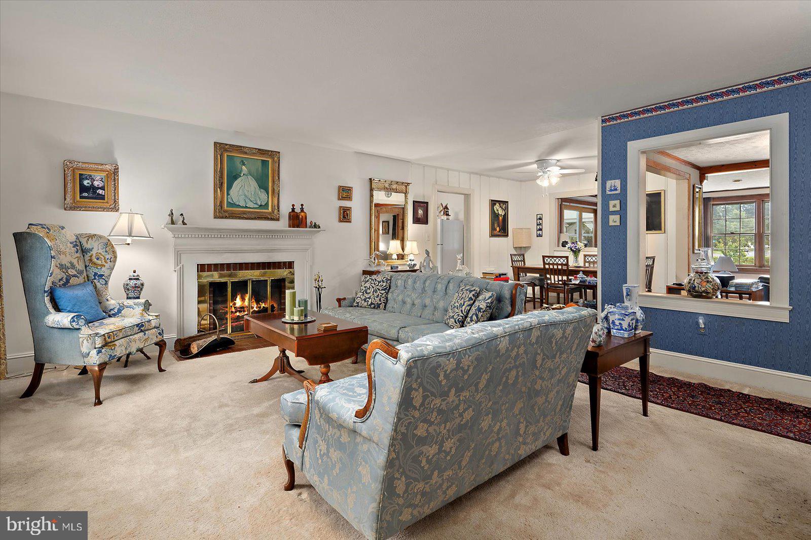 1001 Riverside Drive Salisbury, MD 21801 - Photo 5 of 47 a living room with furniture and a fireplace