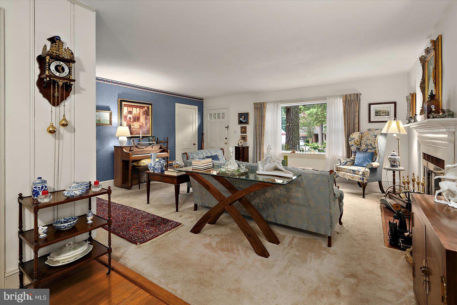 1001 Riverside Drive Salisbury, MD 21801 - Photo 7 of 47 a living room with furniture and a chandelier