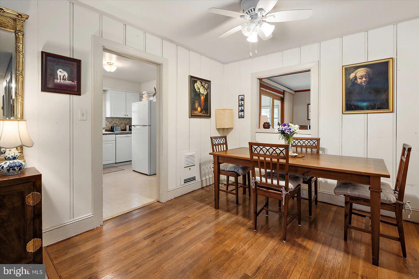 1001 Riverside Drive Salisbury, MD 21801 - Photo 9 of 47 a view of a dining room with furniture and wooden floor