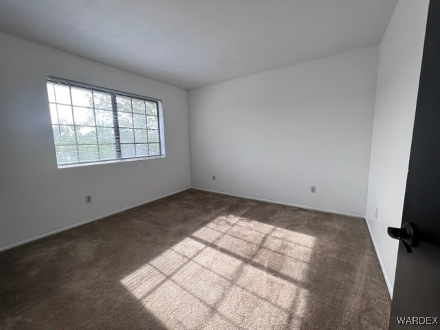 1190 Ramar Road, Unit 46 Bullhead City, AZ 86442 - Photo 19 of 36 an empty room with windows