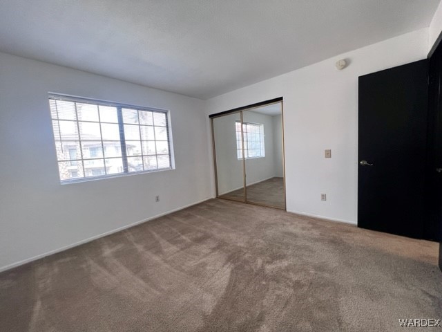 1190 Ramar Road, Unit 46 Bullhead City, AZ 86442 - Photo 24 of 36 an empty room with windows