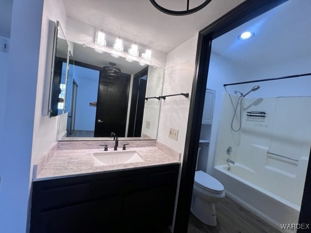 1190 Ramar Road, Unit 46 Bullhead City, AZ 86442 - Photo 27 of 36 a bathroom with a sink a toilet and shower