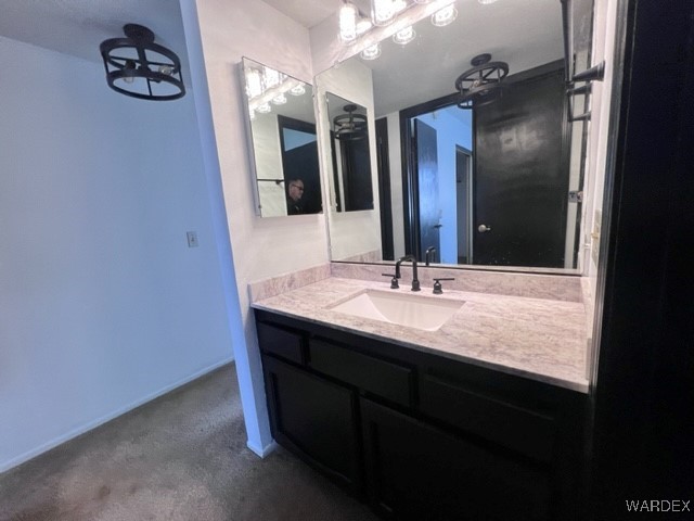 1190 Ramar Road, Unit 46 Bullhead City, AZ 86442 - Photo 29 of 36 a bathroom with a sink and a mirror