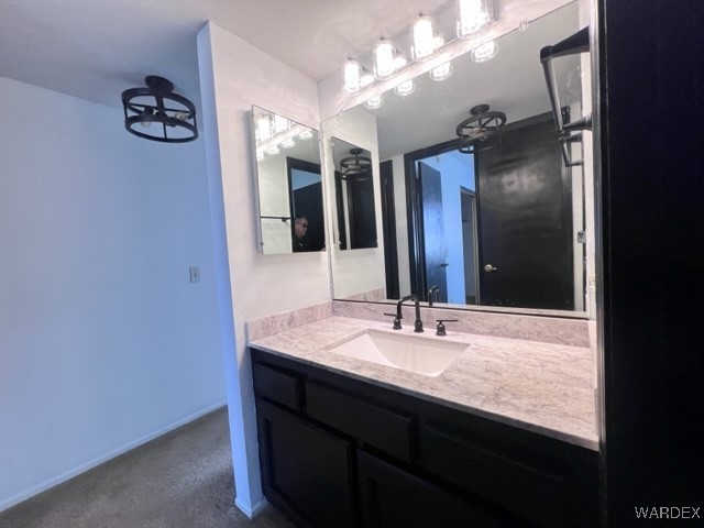 1190 Ramar Road, Unit 46 Bullhead City, AZ 86442 - Photo 30 of 36 a bathroom with a granite countertop sink a large mirror and a shower
