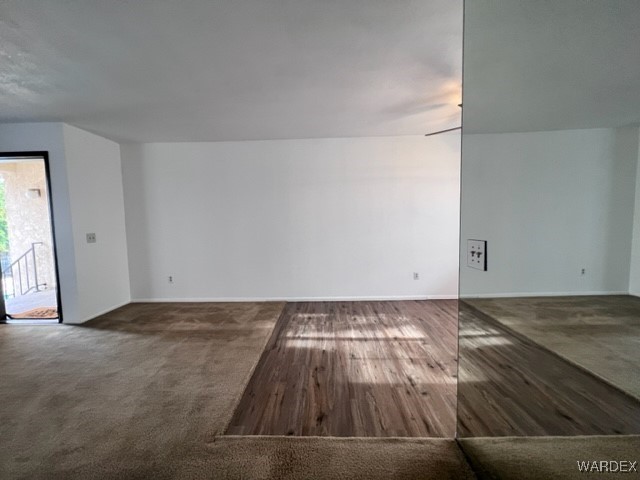 1190 Ramar Road, Unit 46 Bullhead City, AZ 86442 - Photo 10 of 36 an empty room with wooden floor