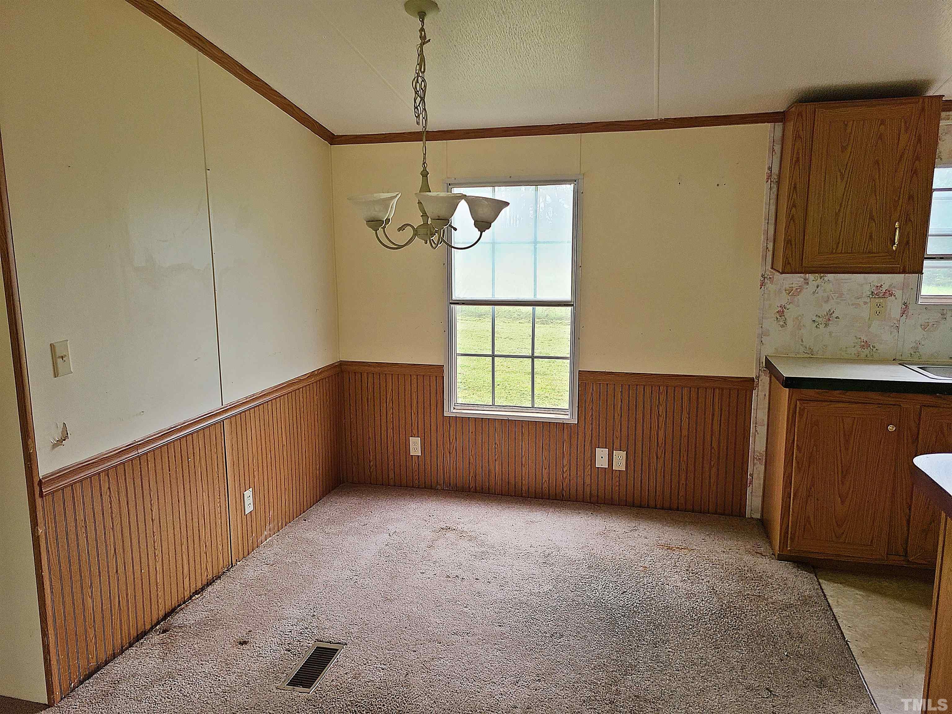 95 Moore Perkerson Road Spring Hope, NC 27882 - Photo 17 of 31 a view of an empty room with a window