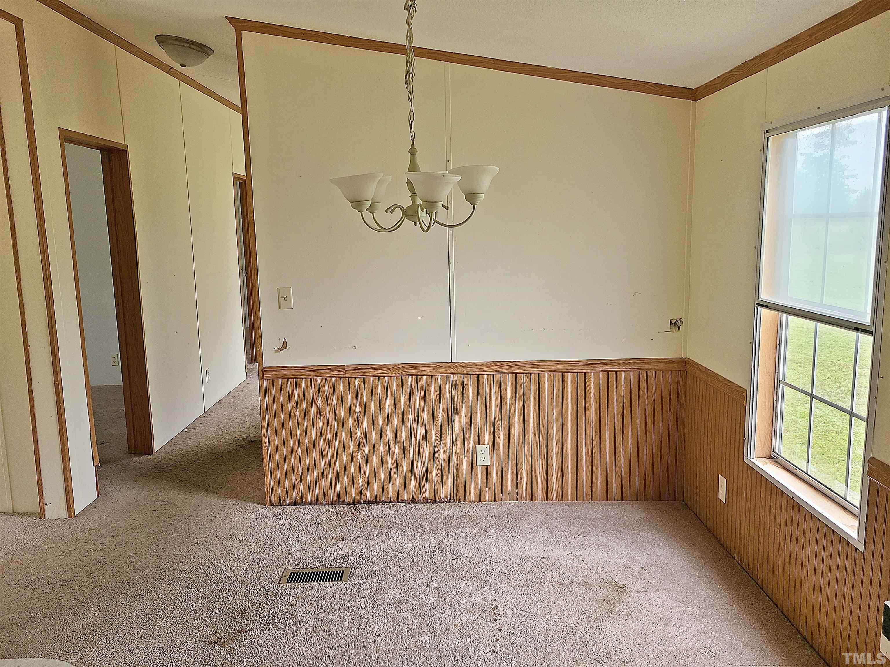 95 Moore Perkerson Road Spring Hope, NC 27882 - Photo 18 of 31 a view of an empty room with a window