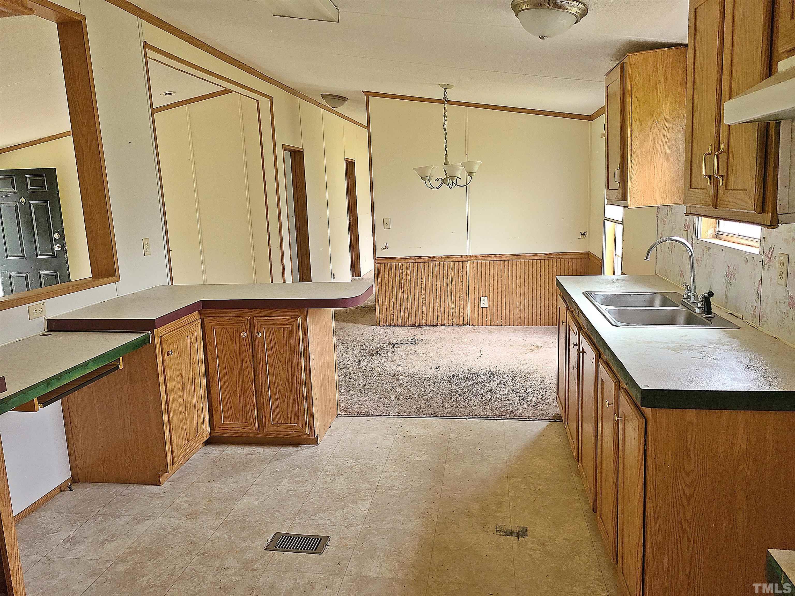 95 Moore Perkerson Road Spring Hope, NC 27882 - Photo 20 of 31 a bathroom with a sink a mirror and shower