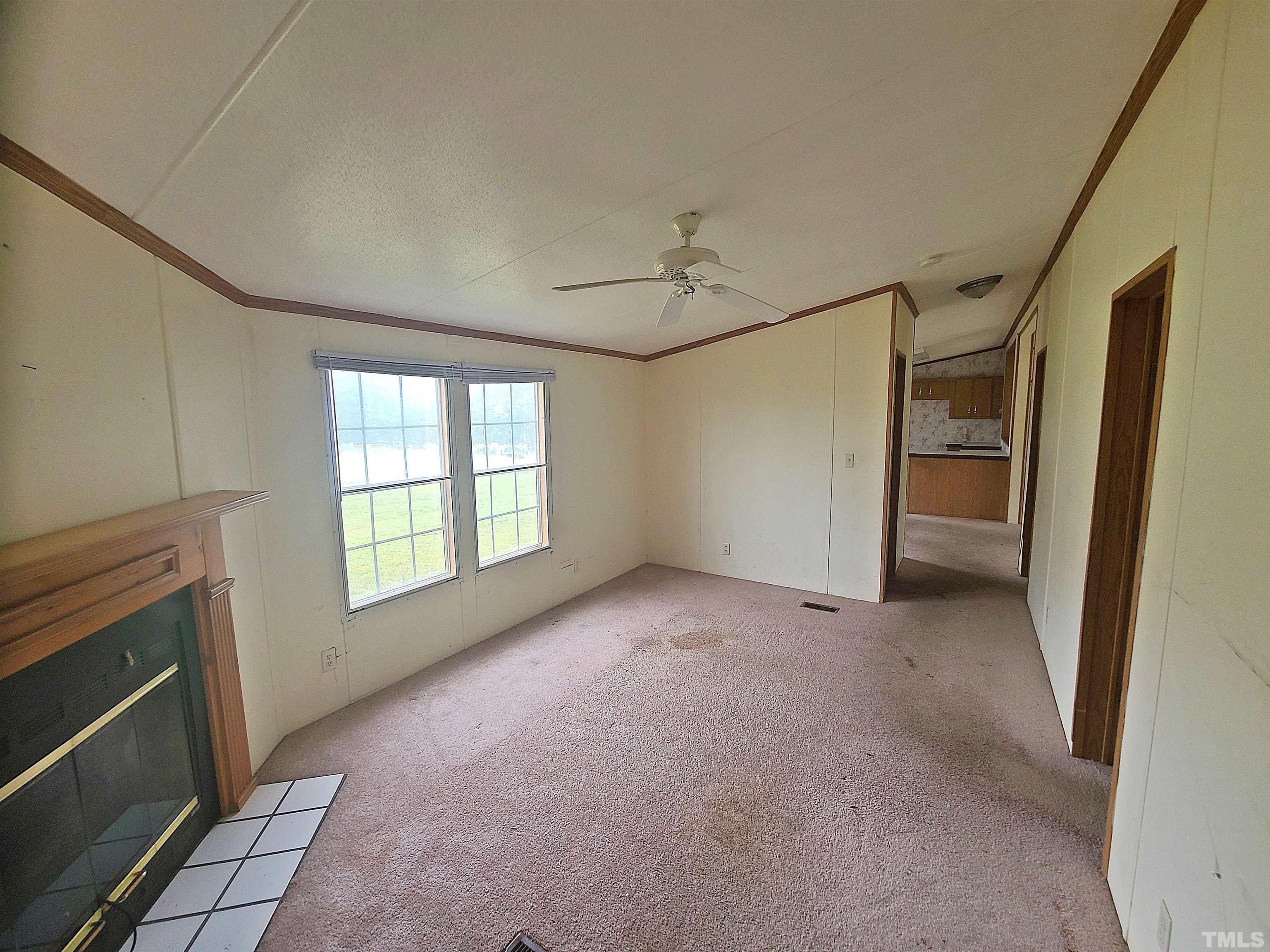 95 Moore Perkerson Road Spring Hope, NC 27882 - Photo 26 of 31 a view of empty room with a fireplace